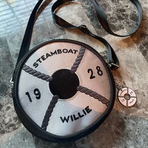 Steamboat Willie Harvey’s seatbelt mini circle crossbody bag.